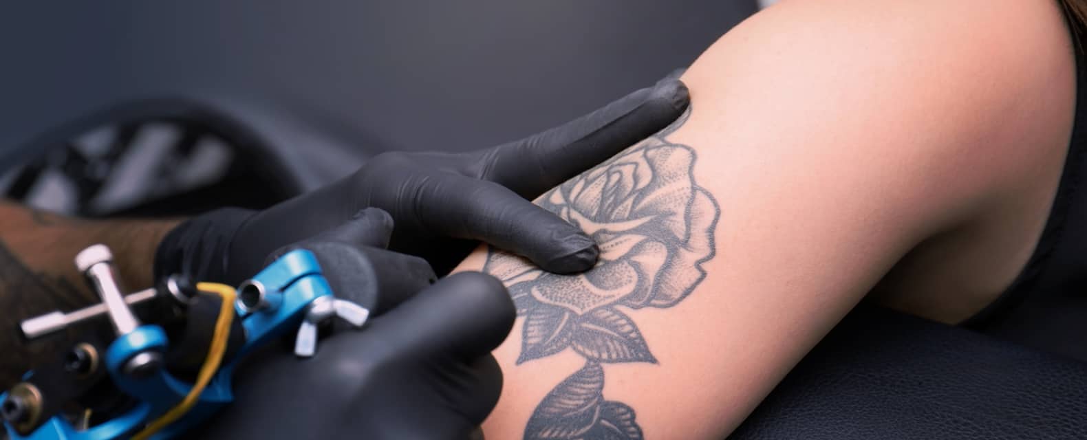Image of a person getting a tattoo